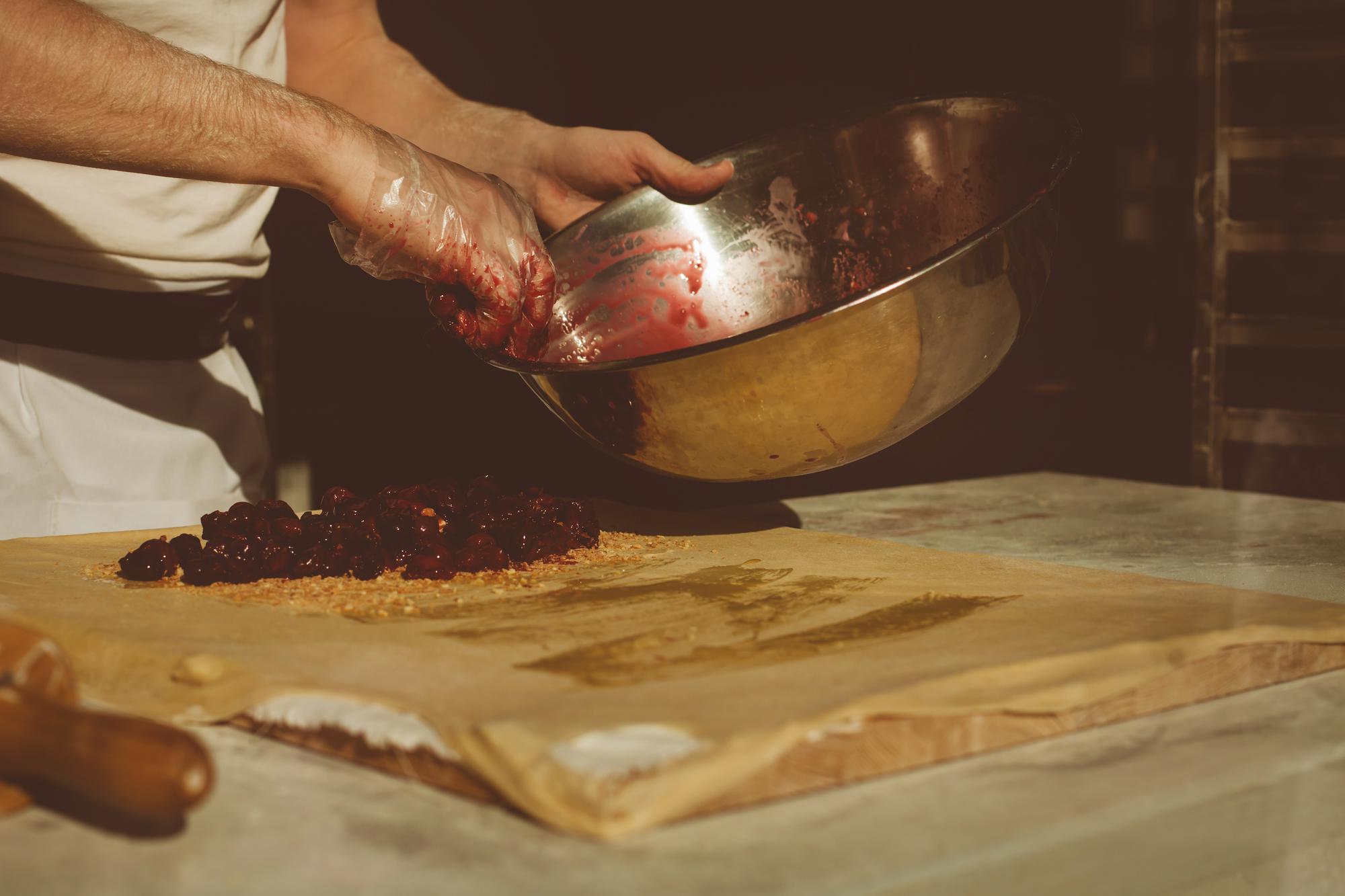 Chef preparing a rustic local dish